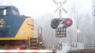 railroad crossing with lowered gate