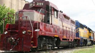 Vintage Train at a crossing - driversprep.com