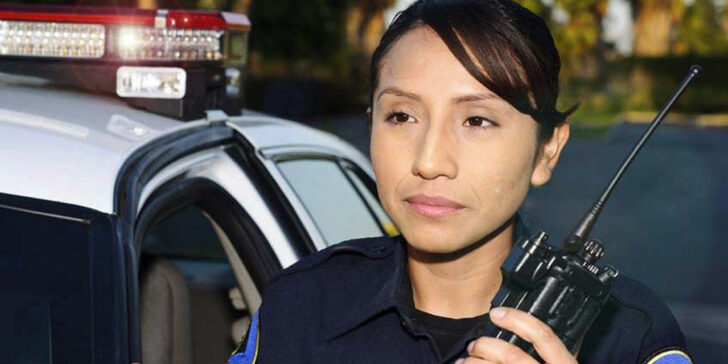 Hispanic police officer - copyright: John Roman