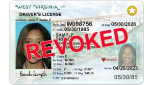 West Virginia driver' license with the word revoked
